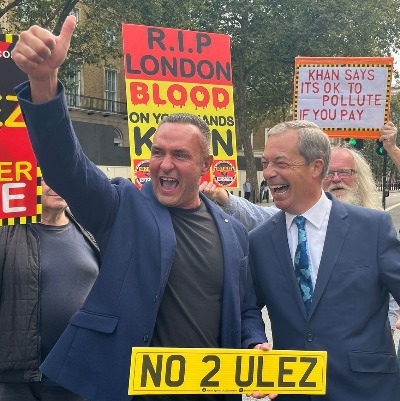 Noel celebrating ULEZ victory with Nigel Farage